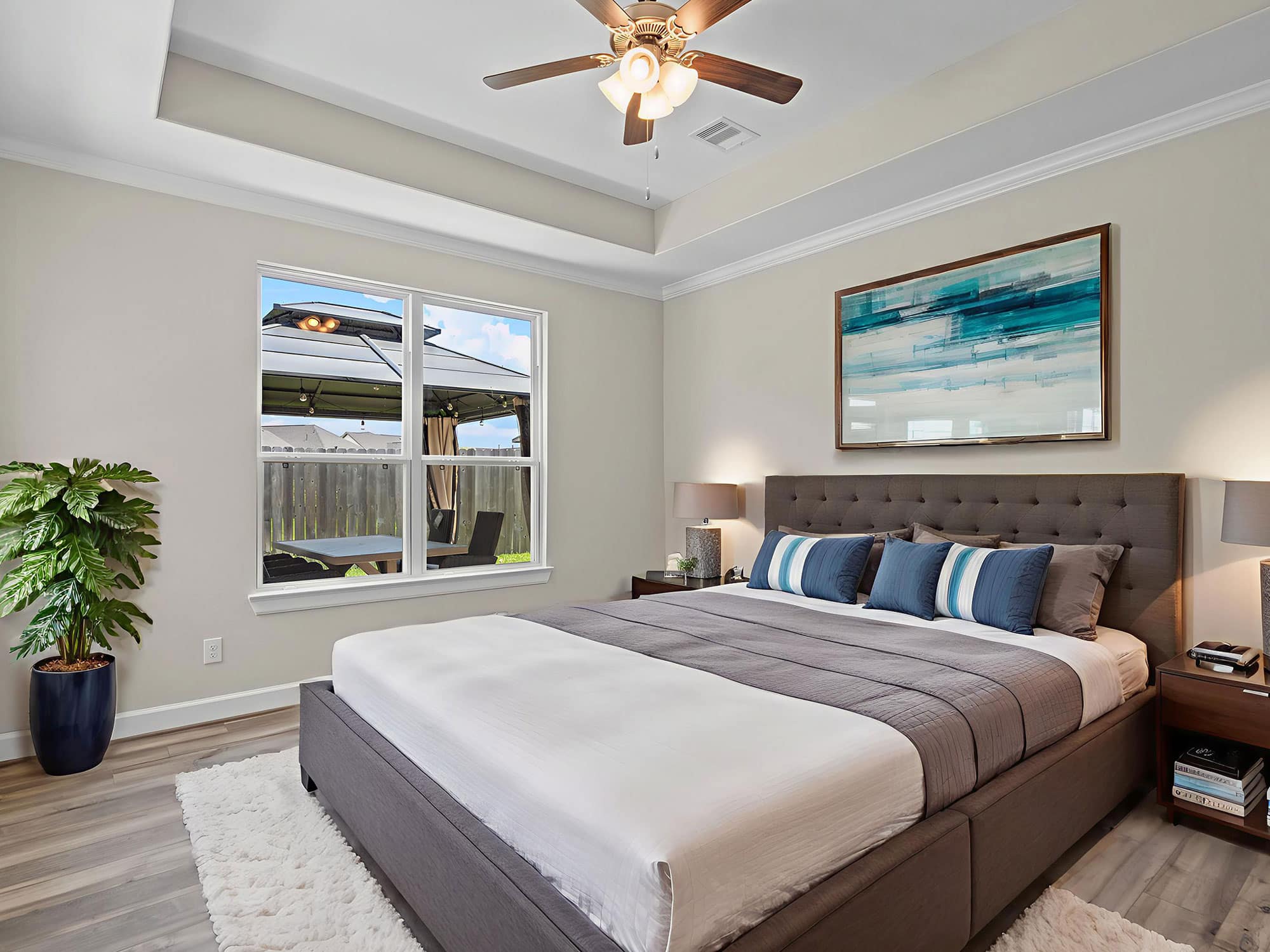 Promenade III primary bedroom with tray ceiling at 1214 Hidden Oaks Dr